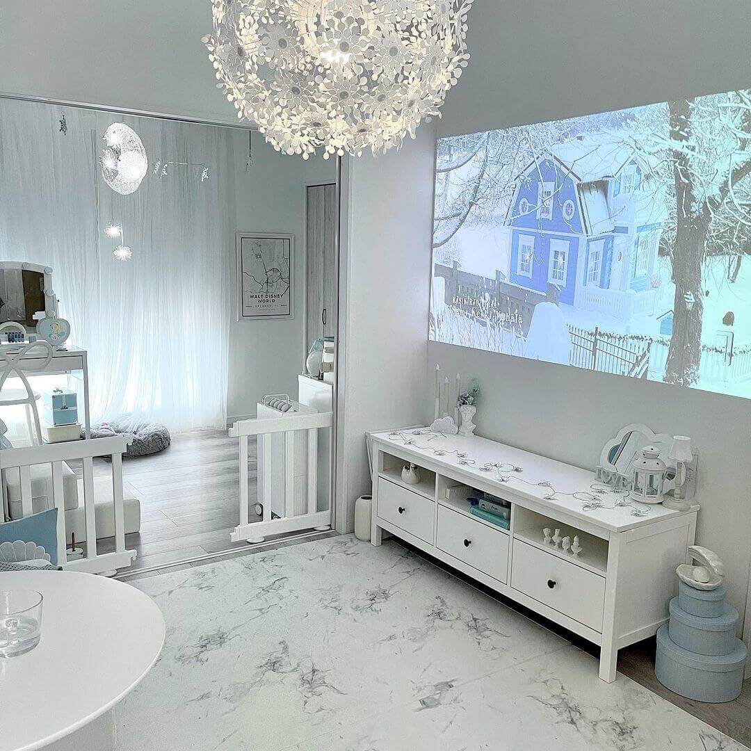 projecting romantic movie on the white wall in bedroom