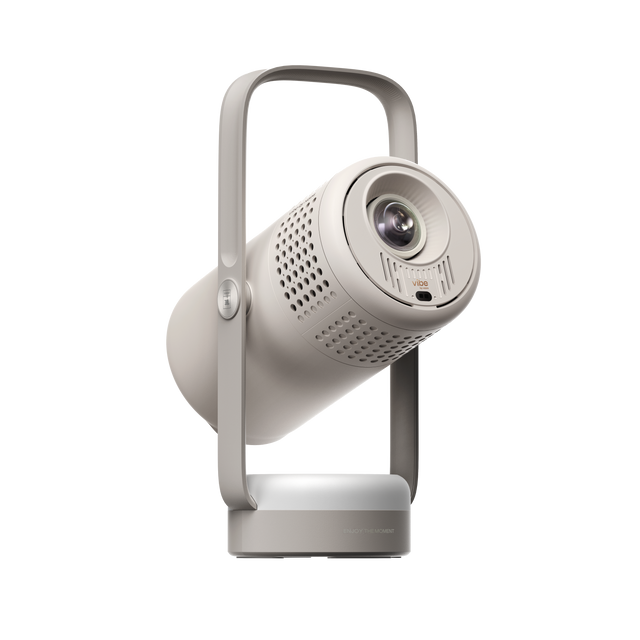 Vibe One battery powered portable projector in light beige, showing front lens and handle.