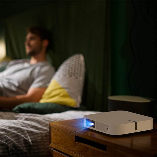 enjoy home cinema with the Elfin mini projector in bedroom